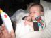 Celebrate! Unity - 2 months old!: looking at my new lights toy!